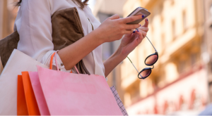Women carrying shoppings bags and using smartphone, Retail, Shopping, Women, Only Women, Fashion, texting, smartphone, city